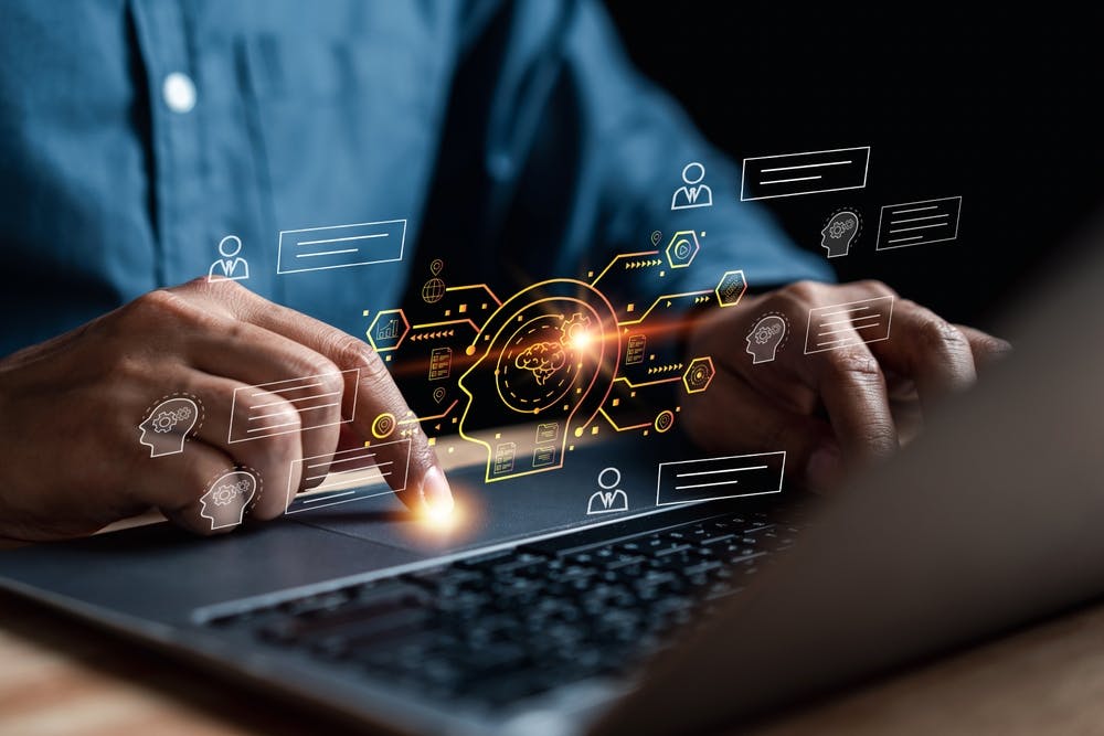 laptop with AI overlay projected above the keyboard